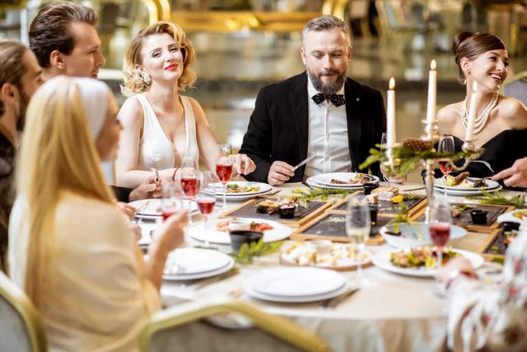 elegantly-dressed-people-having-a-festive-dinner-i-2025-03-15-06-51-17-utc